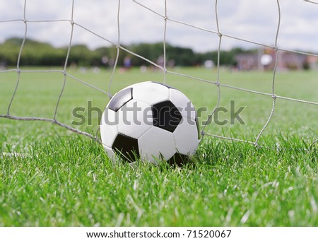 Football in the goal net
