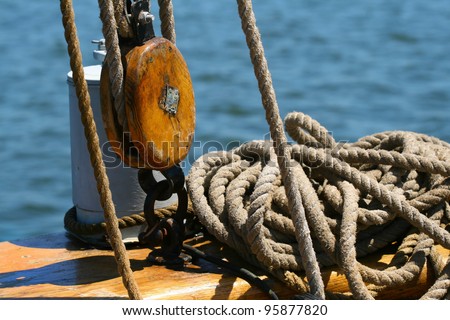 nautical pulleys with ropes on the deck of a ship old