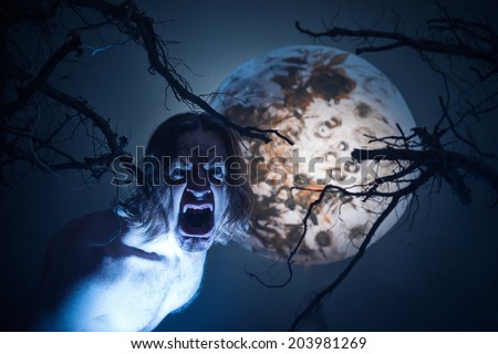 Scary man on moon background