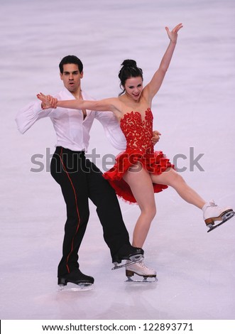 PARIS - NOVEMBER 17: Anna CAPPELLINI / Luca LANOTTE of Italy perform at ice dance free dance event at Eric Bompard Trophy on November 17, 2012 at Palais-Omnisports de Bercy, Paris, France.