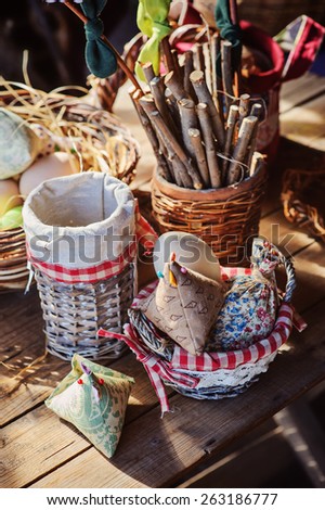 easter decorations on wooden table in country house