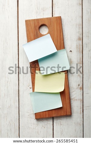 A Blank Recipe Cards (or Shopping List) on a kitchen board