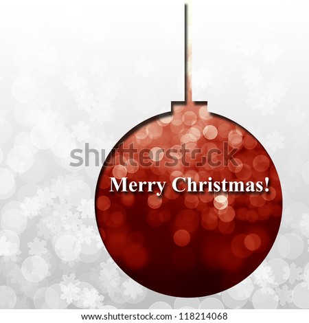 Merry Christmas concept greeting card with Christmas ball against silver defocused lights