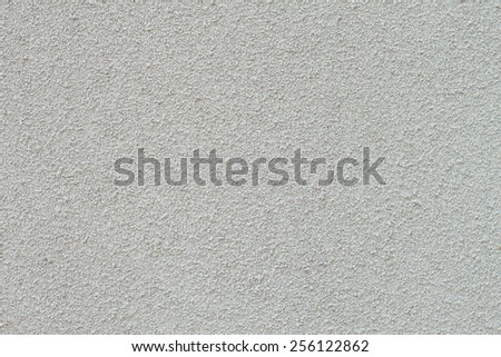 Light sand stone spray on a wall.