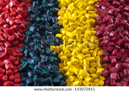 Colourful plastic polymer granules