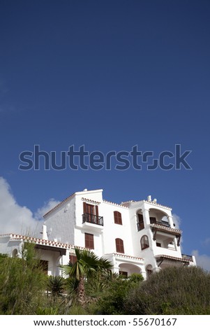 luxury spanish villa with blue sky background