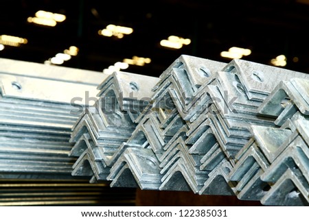 Arrangement of hot-dip galvanized steel angles in warehouse before shipment