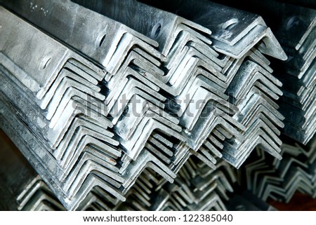 Arrangement of hot-dip galvanized steel angles in warehouse before shipment