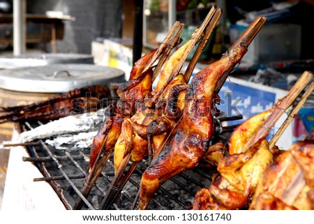Grilling chicken plugged with bamboo, Local Foods of Thailand