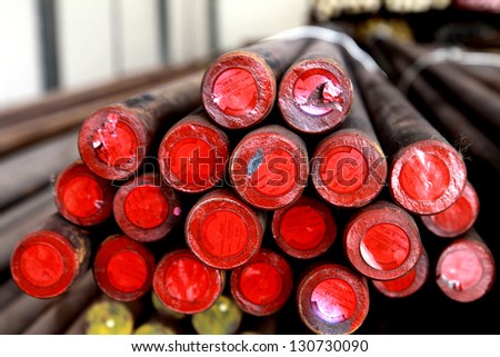 Red steel bars in warehouse