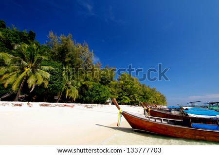 Thailand sea landscape. Nature background with travel boat, sand, blue sky and clear ocean water, Pai Island Krabi Province, Thailand