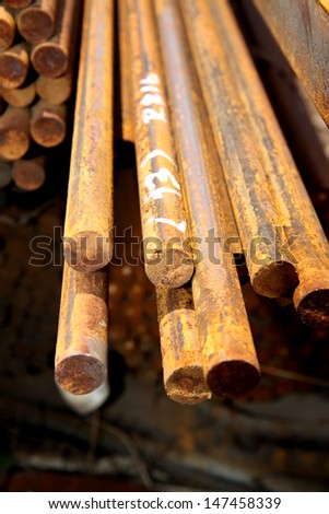 Rust steel bar bunch in warehouse