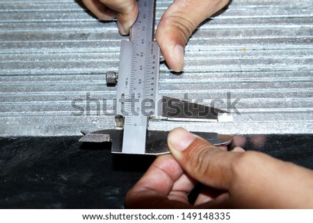 Dimension Check steel plate by vernier