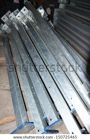 Steel plates, Steel angles & steel pipes bunch on the rack in warehouse