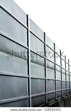 Noise barrier wall on a highway near railway station, Thailand