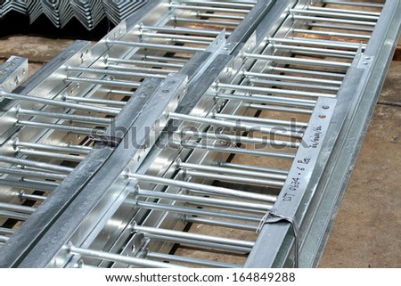 Steel ladders bunch in warehouse before shipment