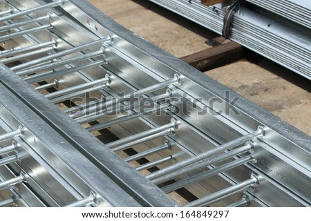 Steel ladders bunch in warehouse before shipment
