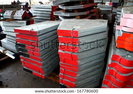 Steel plates bunch on the rack in warehouse