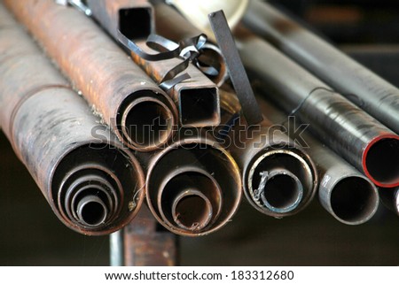 Rust steel pipes bunch in warehouse