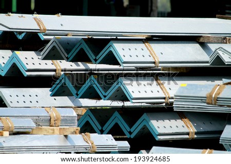Hot-dip steel galvanized bunch on the rack in warehouse