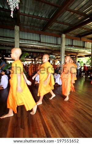 KANCHANABURI-THAILAND-APRIL 6 : Novice ordination ceremony of a summer tradition,Ancient for teach their children to have access to exodus as a child on April 6,2014 in Kanchanaburi,Thailand