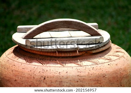 Wooden cover of clay  jar