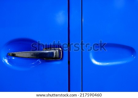 The old car door handle