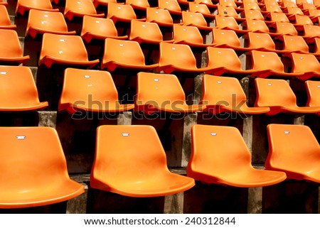 Row of the plastic chair in football stadium