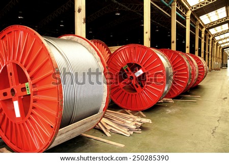 BANGKOK-THAILAND-JULY 22 : Old wooden reels & steel reels of power electrical cable in warehouse on July 22, 2014 Bangkok, Thailand