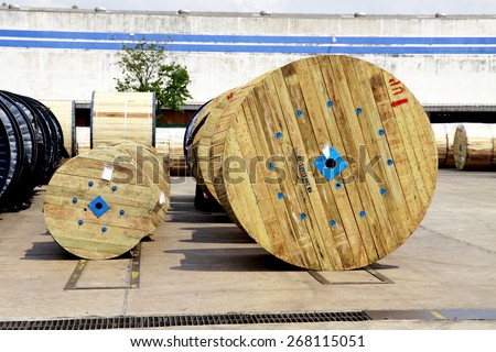 BANGKOK-THAILAND-MARCH 11 : Old wooden wheel of electrical cable in warehouse before shipment on March 11, 2015 Bangkok, Thailand