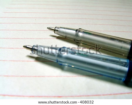 Blank piece of letter paper with writing ball-pens