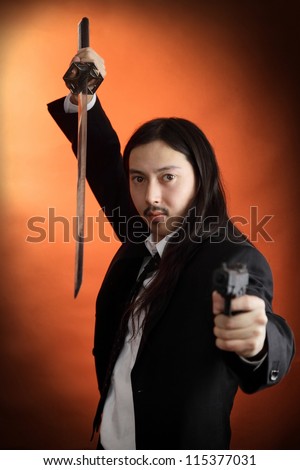 Man with sword and pistol