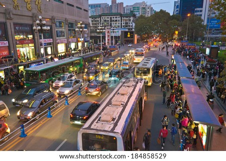 CHENGDU,CHINA - NOV 12,2011: Crowd people waiting for bus on the bus station.