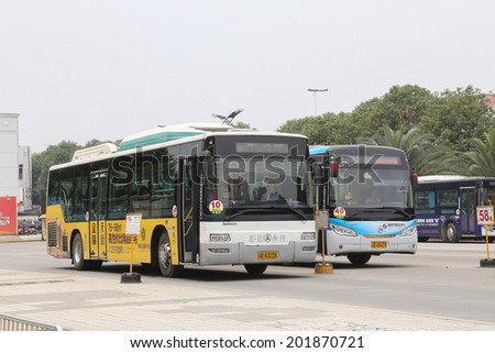 MIANYANG,CHINA - JUNE 6,2014:bus stopped are waitting the passengers.