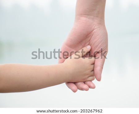 hand in hand,small hand in big hand