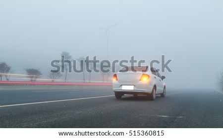 car in the fog