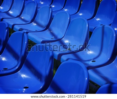 Rows of empty chairs prepared for a open air event