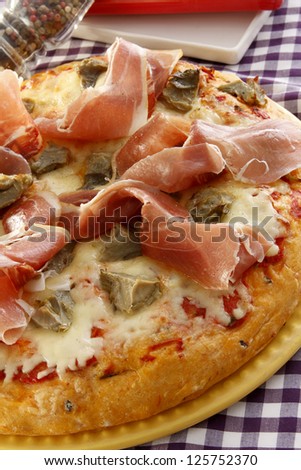 Prosciutto and Artichoke pizza recipe, on table