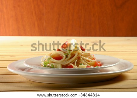 recipe of spaghetti pasta with natural vegetables and cheese sauce, italian style