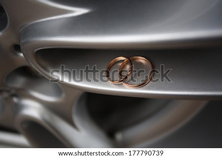 Wedding rings on the car drive Wedding rings and car