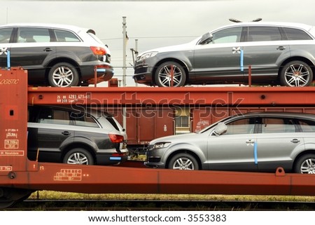 Four cars on rail platform