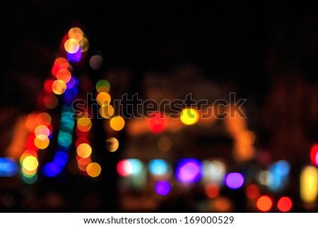 abstract background of blurred warm  and cool lights with warm background with red spots with bokeh effect