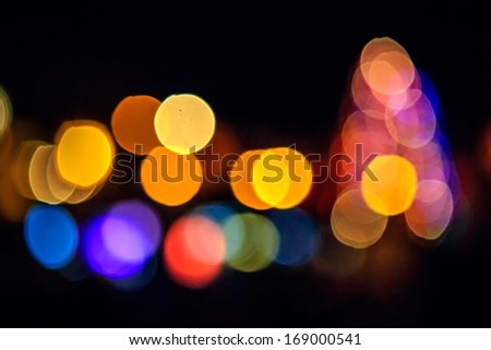 abstract background of blurred warm  and cool lights with warm background with red spots with bokeh effect