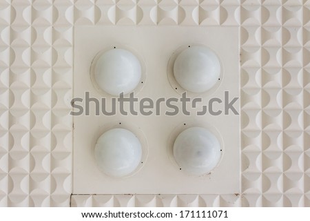 abstract geometric pattern of ellipse shapes plaster ceiling with circle lamp