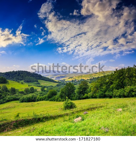 Autumn Landscape. Village On The Hillside. Forest On The Mountain. Light Fall On Clearing On Mountains