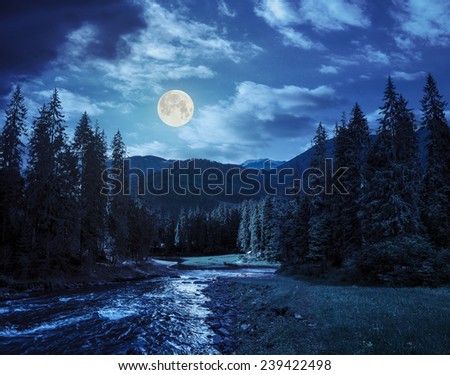 collage landscape with pine trees in mountains and a river in front flowing to lake at night in full moon light