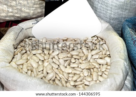 Sack with white beans. Closeup of a sack with white beans