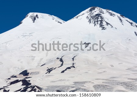 Mount Elbrus, the summit of Mount 5621 (east) and 5642 (west). Dormant volcano located in the western Caucasus mountain range. The highest peak in Russia.