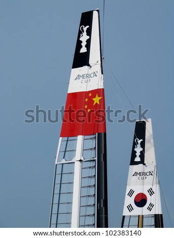 VENICE, ITALY - MAY 11: Team Korea and China Team Sails are assembled and mounted on AC45 catamarans in May 11, 2012 in Venice, Italy.
