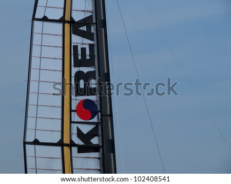 VENICE, ITALY - MAY 11: Team Korea catamaran in the box area waiting for a new test in the Venice lagoon during the America\'s Cup first races days in May 11, 2012 in Venice, Italy.